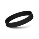 A black silicone wristband with a simple design, pictured against a white background. The wristband appears plain and slightly elevated, casting a soft shadow below.