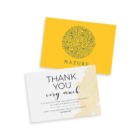 A yellow card with a green nature-themed design featuring leaves and birds. Below, a white card with the text Thank You Very Much, offering a 15% discount on the next order.