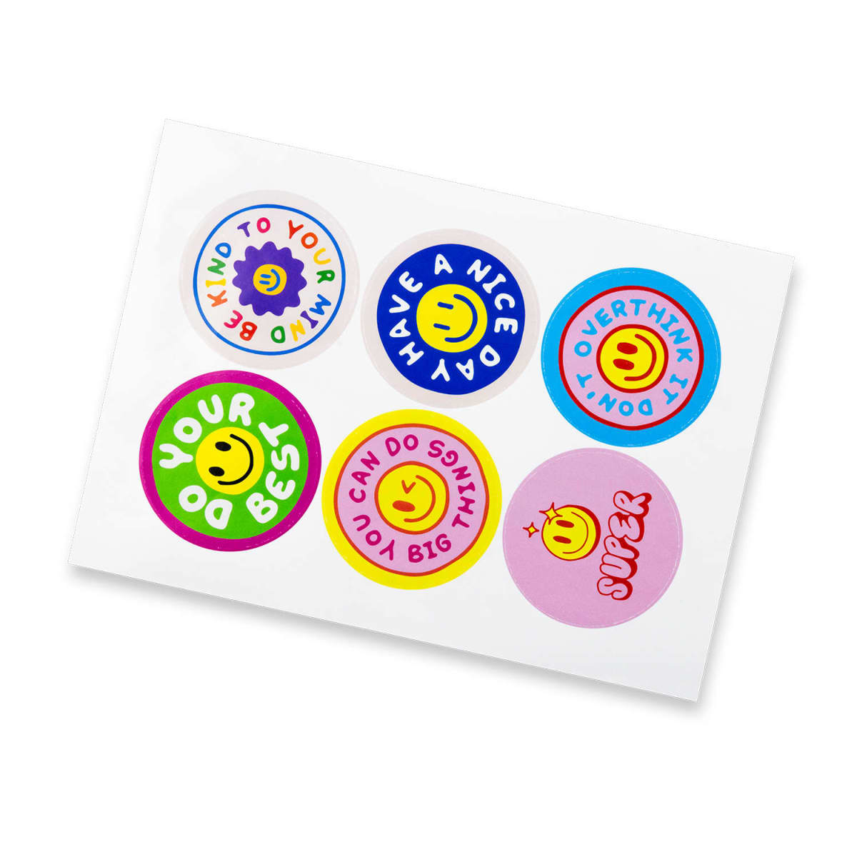 A sheet of colorful, round stickers featuring positive messages and smiley faces. Phrases include Be Kind to Your Mind, Have a Nice Day, Dont Overthink It, Do Your Best, You Can Do Big Things, and Super.