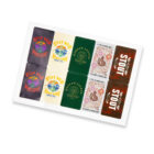 A set of decorative cards with various designs and texts. Designs include vintage logos, the phrase Stay Wild Roam Free, floral patterns, and STOUT. Colors range from dark to pastel tones on different card backgrounds.
