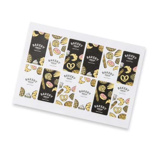 Stickers with a bakery theme featuring pastries like pretzels and croissants on white and black backgrounds. Each sticker bears the text Bakery Shop with illustrated baked goods in yellow and pink accents.