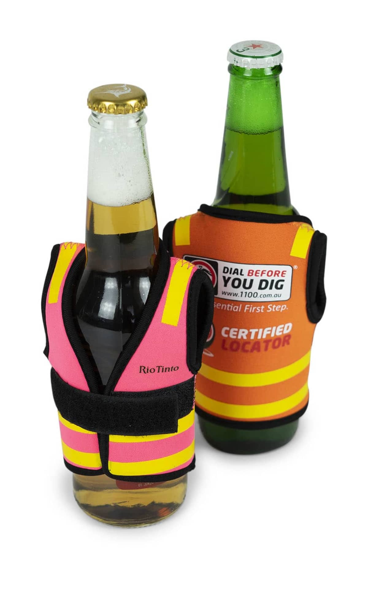 Two beer bottles wearing miniature safety vests. One bottle has a pink and yellow vest, and the other has an orange and yellow vest labeled Certified Locator with a website URL.