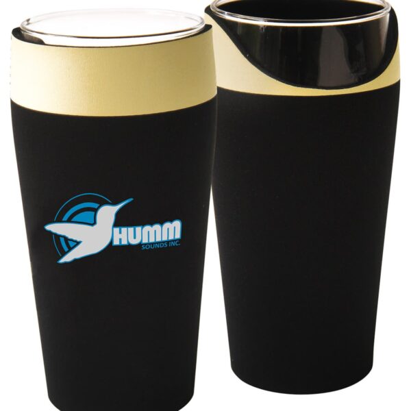 Two black drink koozies with beige rims. One koozie shows the Humm Sounds Inc. logo featuring a hummingbird design. The other koozie is inverted to display the rim detail.
