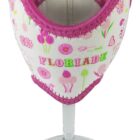 A wine glass with a pink floral neoprene cooler wrapped around it. The cooler features illustrations of flowers, tulips, and the word FLORIDA in colorful letters.