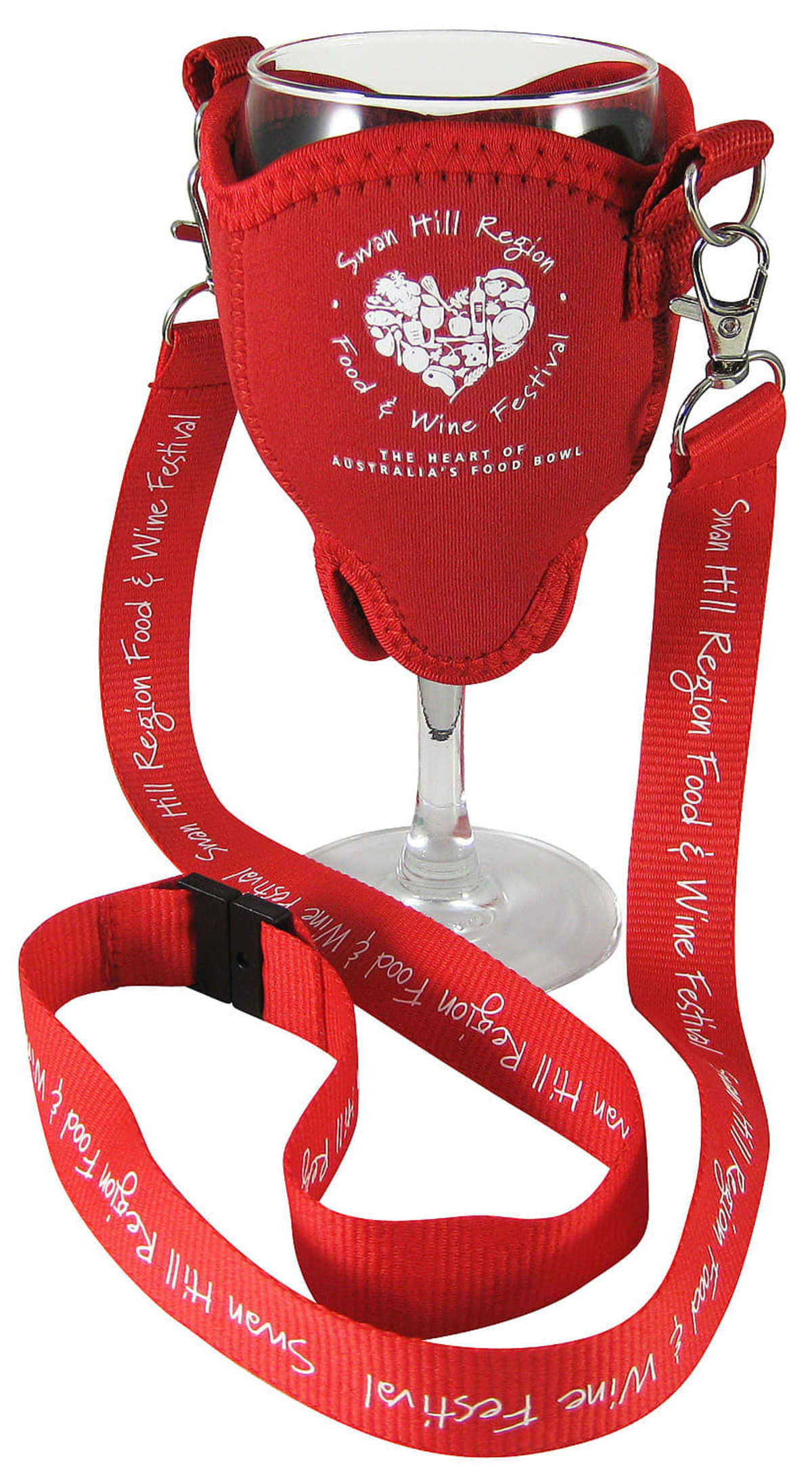 A wine glass is held in a red fabric holder with a neck strap. The strap is printed with Swan Hill Region Food & Wine Festival in white text. The holder is designed to be worn around the neck for convenience.