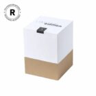 A cube-shaped box with a white upper half and a brown lower half. It has Limited edition text on the top. A Packaging Registered logo appears on the top left corner of the image.