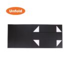 Black tri-fold display board with white triangular sections visible at the corners. An orange oval with the word Unfold is in the top left corner.