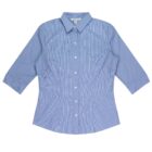 A blue, checkered womens shirt with three-quarter length sleeves and white buttons, laid flat against a white background. The shirt features a collar and a fitted design.