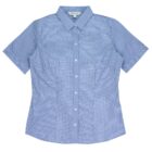 A blue short-sleeved button-up shirt with a small checkered pattern. The shirt has a classic collar and white buttons down the front. Its neatly laid out on a flat surface.