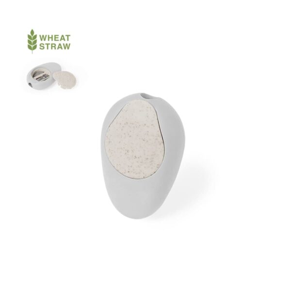 A small, oval-shaped, gray sharpener with a large white button in the center. The inset image shows the sharpener open with visible blades, and a Wheat Straw label above, suggesting eco-friendly material.