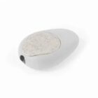 A white, oval-shaped handheld device with a speckled gray pad on top. It has a small circular cavity on one side. The design is minimalist, and the surface has a smooth texture.