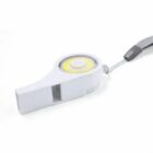 A white plastic whistle with a circular LED light embedded on top, attached to a gray lanyard. The whistle features a sleek, modern design, and the lanyard has a plastic clip for easy attachment.