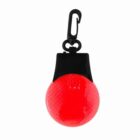 A small, round red reflective safety light with a black clip attached, designed for easy attachment to bags, backpacks, or clothing for visibility.