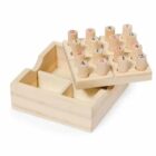 Wooden puzzle box with a sliding lid and pegs numbered 1 to 4 in red and blue. The box has two compartments and a grid with holes for the pegs.