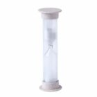 A clear hourglass with white sand is positioned vertically, featuring stone-textured caps on both ends. The sand has partially trickled into the bottom half, indicating the passage of time. The background is plain white.
