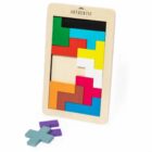 A wooden puzzle features colorful Tetris-like pieces arranged within a rectangular frame. Some pieces, in purple and teal, are outside the frame. The word Authentic is printed on the frames top edge.