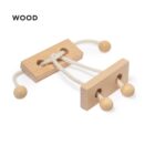 A wooden puzzle featuring two rectangular blocks connected by a string with beads on each end. The blocks have holes through which the string is threaded. The word WOOD appears in the top left corner.