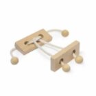 Wooden puzzle toy featuring two rectangular blocks with holes, connected by a white rope threaded through the holes. The rope ends and the middle are secured with wooden beads.