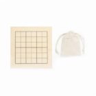 A blank grid board with a 5x5 layout next to a small drawstring bag, both set against a plain white background.