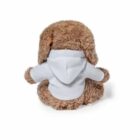 A brown plush toy with floppy ears is sitting and facing away from the viewer. It is wearing a light gray hoodie. The toy is on a plain white background.