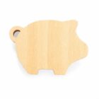 A wooden cutting board shaped like a pig, featuring a smooth, light wood texture with a small hole near the ear for hanging.
