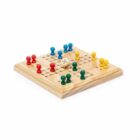 A wooden Ludo board with colorful game pieces: red, blue, green, and yellow. A single die is placed in the center, surrounded by the pieces arranged at different positions on the board.