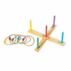 A wooden ring toss game with colorful pegs, each marked with different numbers, and several rope rings with colored accents. The base forms an X shape, and the game is set up for play.