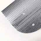 Silver bubble wrap insulation material with a textured surface is displayed. The close-up view highlights its circular bubble pattern and reflective quality, set against a white background.