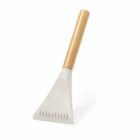 A concrete and wood ice scraper with a wide, flat blade and a wooden handle.