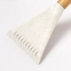 Close-up of a white ice scraper with a wooden handle on a white background.