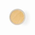 Round wooden tray with a light bamboo surface and a beige rim, viewed from above against a white background.