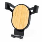 A bamboo-themed phone holder with black clamps and a base, designed to attach to a car vent. The central panel features a light wood pattern, contrasting with the sleek black arms for a modern look.