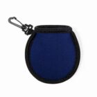 A small, round, navy blue pouch with a black border and a carabiner clip on top. The pouch appears to be made of soft fabric and is likely used for holding small items or accessories.