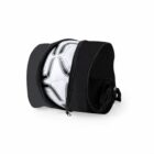 A black sports bag with an open front zipper, revealing a white and black soccer ball partially visible inside. The bag appears to be compact and has a handle on the side.