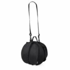 A black round backpack with a single adjustable shoulder strap, two-way zippers, and a handle on top.