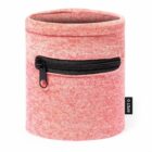 A cylindrical pink fabric desk organizer with a textured surface and a small black zippered pocket on the front. Theres a black tag on the side with RPET printed on it.