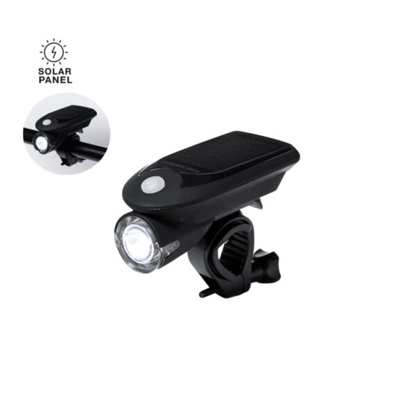 A black bicycle headlight with a solar panel on top is shown. It has a white light at the front and a mounting bracket underneath. An inset image displays the light attached to a bicycle handlebar.