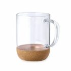 Clear glass mug with a cork base and handle, set against a white background.