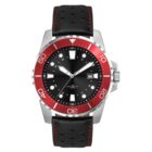 A stainless steel watch with a bold red bezel displaying minute markers. It has a black dial with luminous hands, date window, and a black perforated leather strap with red stitching.