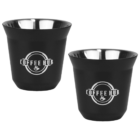 Two black coffee cups with stainless steel interiors featuring the Coffee Hub logo in white. The logo includes a circular design and a small coffee cup icon. The cups are displayed against a plain white background.