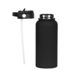 A black, matte-finished water bottle with a silver mouthpiece and a spout lid removed, displaying a straw. The bottle is placed upright with the lid next to it, emphasizing its modern and sleek design.