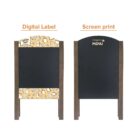 Two wooden sandwich boards with black writing surfaces. The left board is labeled Digital Label and features a coffee-themed border. The right board is labeled Screen print and has MENU printed at the top.