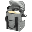 A gray insulated picnic bag with black handles is open to reveal wooden plates, a stack of other plates, and a white insulated bottle in the side pocket. The bag features multiple compartments and a zippered lid.