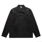 A black button-up jacket with a classic collar, featuring a chest pocket and two large pockets at the bottom. The jacket has a minimalist design with a straight cut and metal buttons.