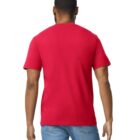 A person wearing a bright red t-shirt and blue jeans is standing with their back to the camera against a plain white background.