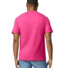 A person with short hair is standing with their back to the camera, wearing a bright pink T-shirt and blue jeans.