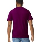 A person wearing a plain purple t-shirt and blue jeans is standing with their back to the camera against a white background.