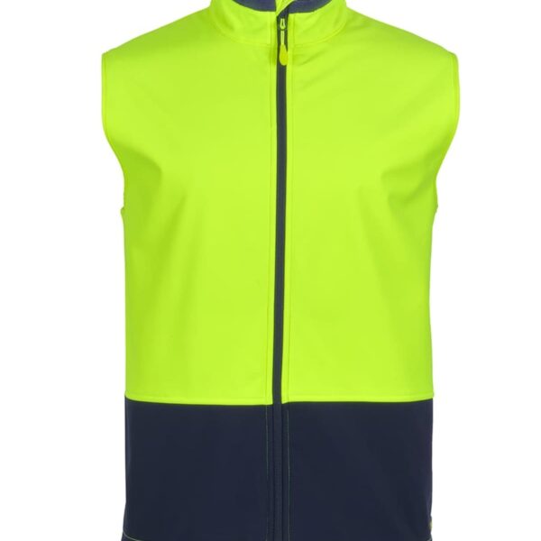 A sleeveless jacket with a high collar, featuring a neon yellow top half and a dark navy blue bottom half. It has a front zipper running down the center.