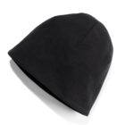 A black beanie hat with a smooth texture is positioned against a white background, casting a subtle shadow. The beanies simple design features no visible logos or embellishments.