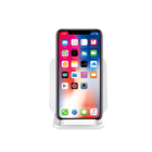 A smartphone with a colorful home screen displaying various app icons is placed in a white charging dock. The screen shows the time as 10:30.